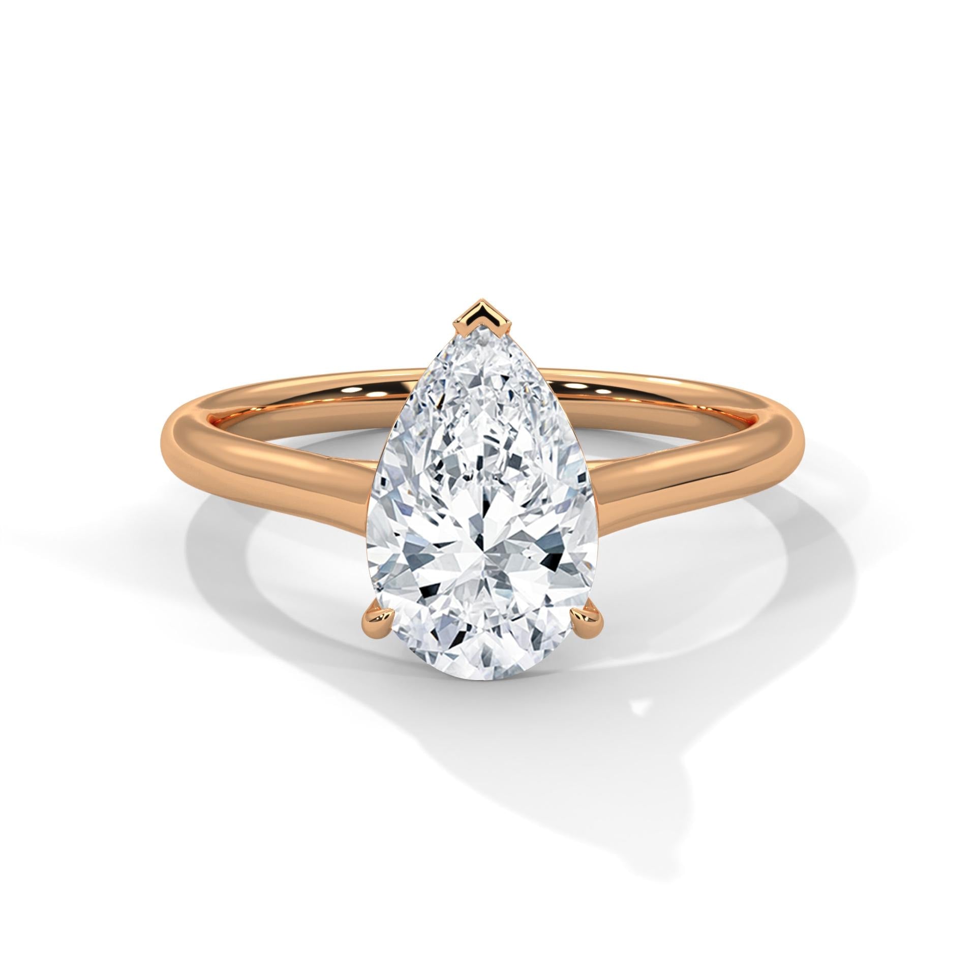 Pear cut lab grown diamond cathedral solitaire ring in rose gold