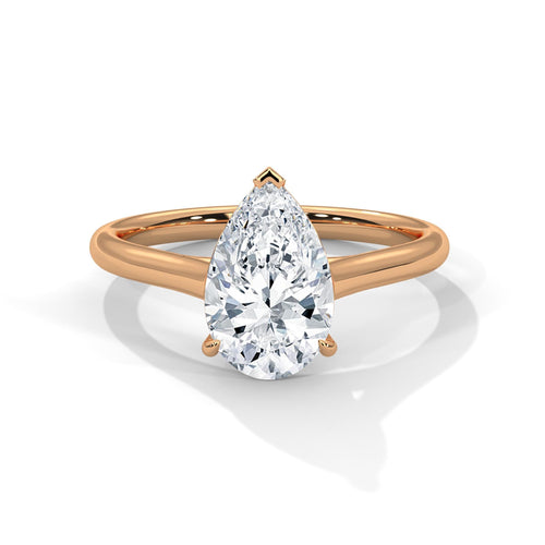 Pear cut lab grown diamond cathedral solitaire ring in rose gold