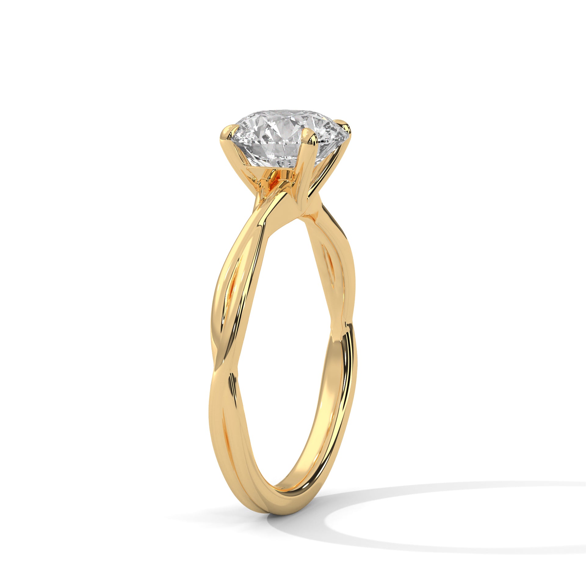 Angled perspective of a twisted rope solitaire ring in yellow gold showcasing the movement of the band.