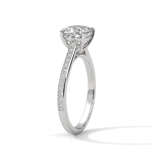 White gold cushion cathedral ring with secure 4-prong setting