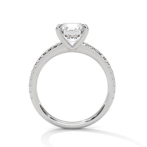 White gold round engagement ring with a shimmering pave diamond shank