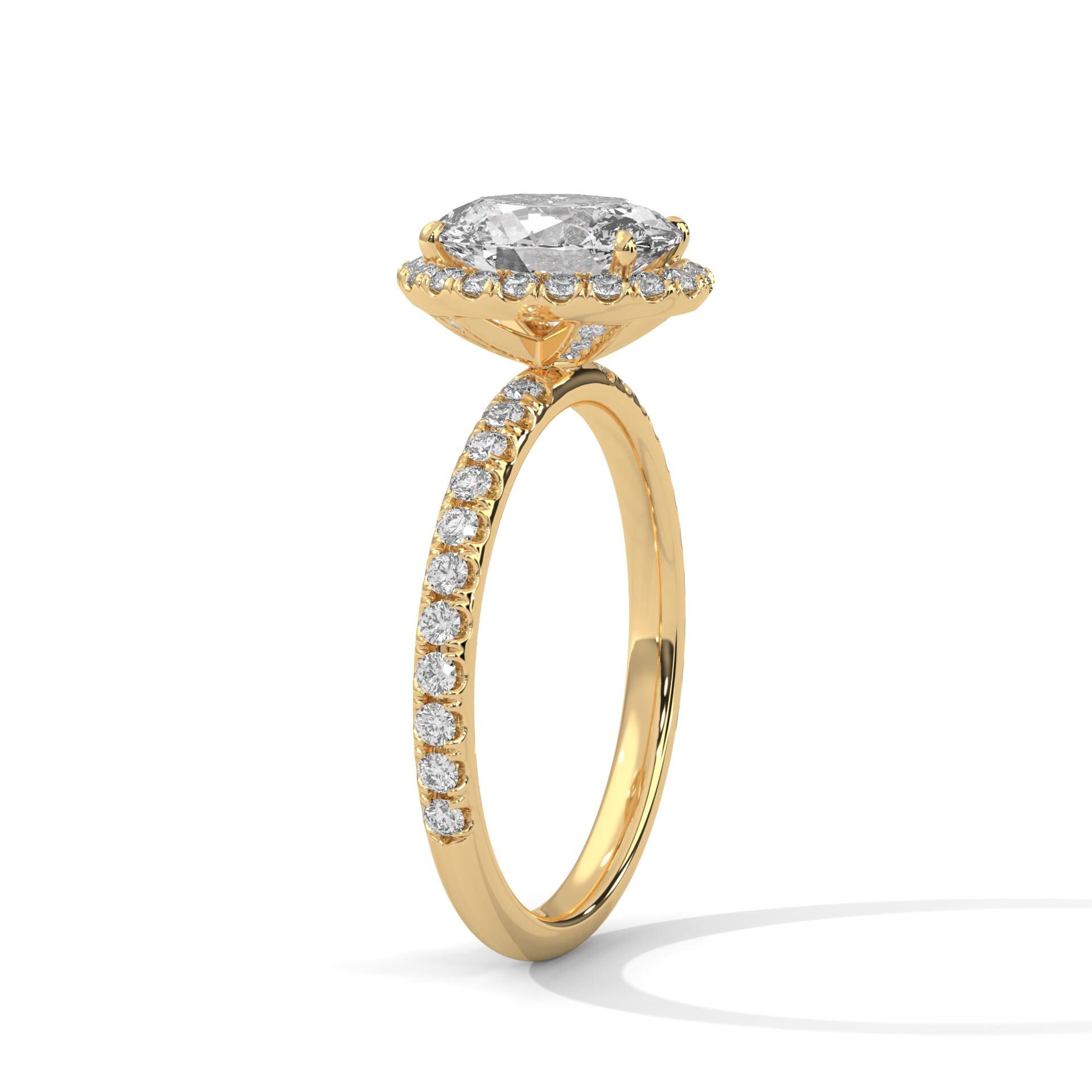 Elevated yellow gold halo mount for oval lab brilliant diamond