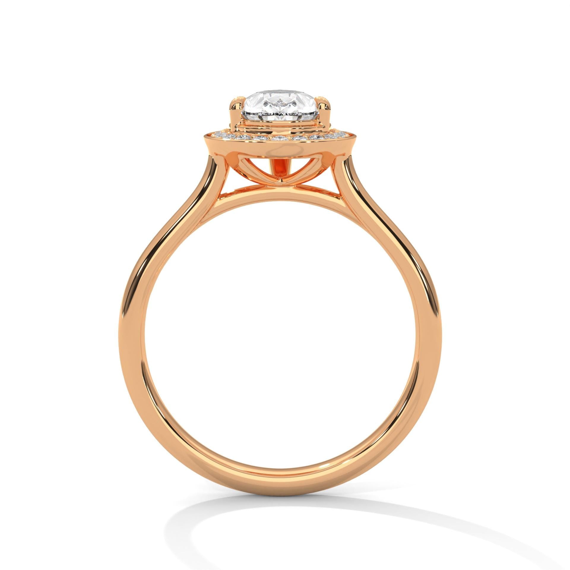 Side view of rose gold pear halo ring showing elegant cathedral arches