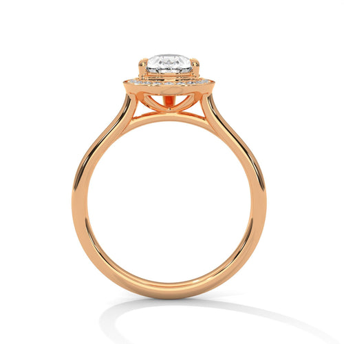 Side view of rose gold pear halo ring showing elegant cathedral arches