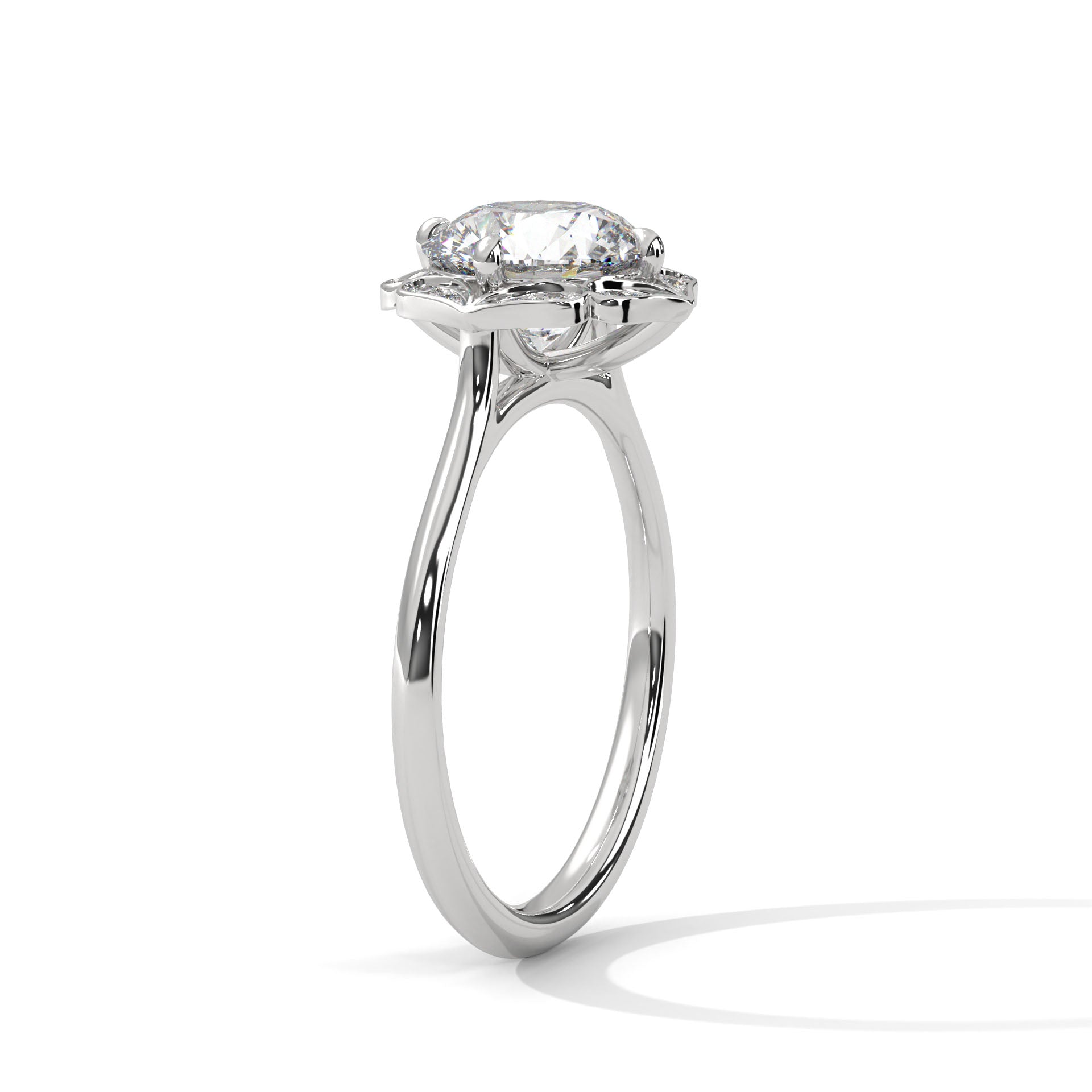 Perspective shot highlighting the petal-like scalloped halo and sleek white gold band.