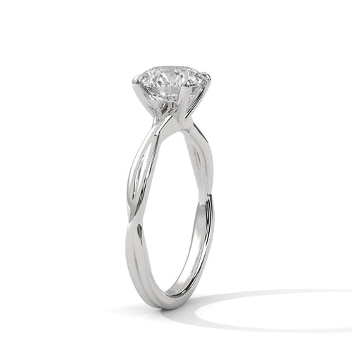 Perspective shot highlighting the intertwined rope texture of the white gold band and the center diamond.