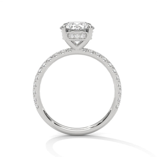 Round brilliant solitaire engagement ring with hidden halo pavé, front-facing view