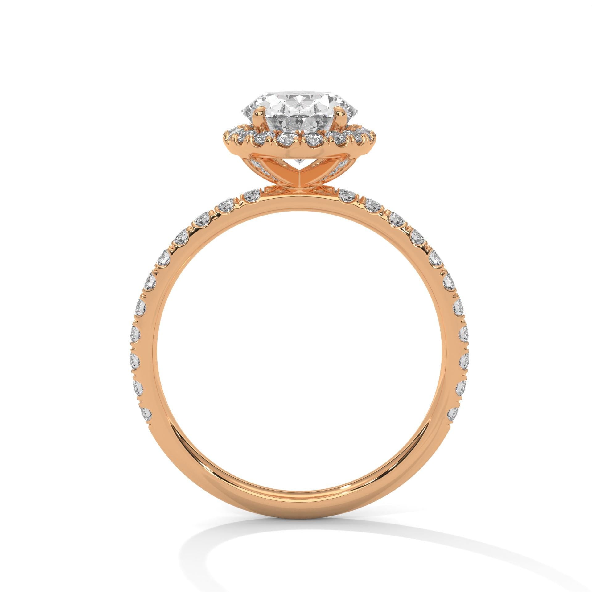 Side view of rose gold oval halo ring showing architectural 4-prong setting