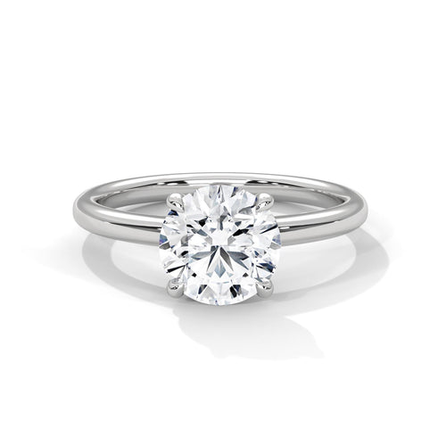 Round brilliant lab grown diamond cathedral solitaire ring in white gold