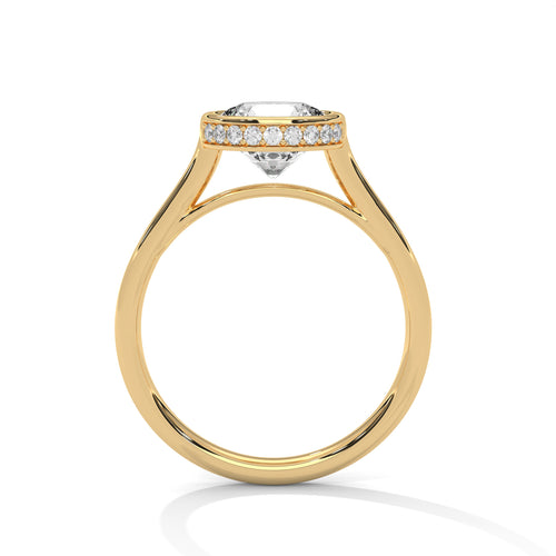 Side profile of a contemporary bezel-set cathedral mount in polished yellow gold.