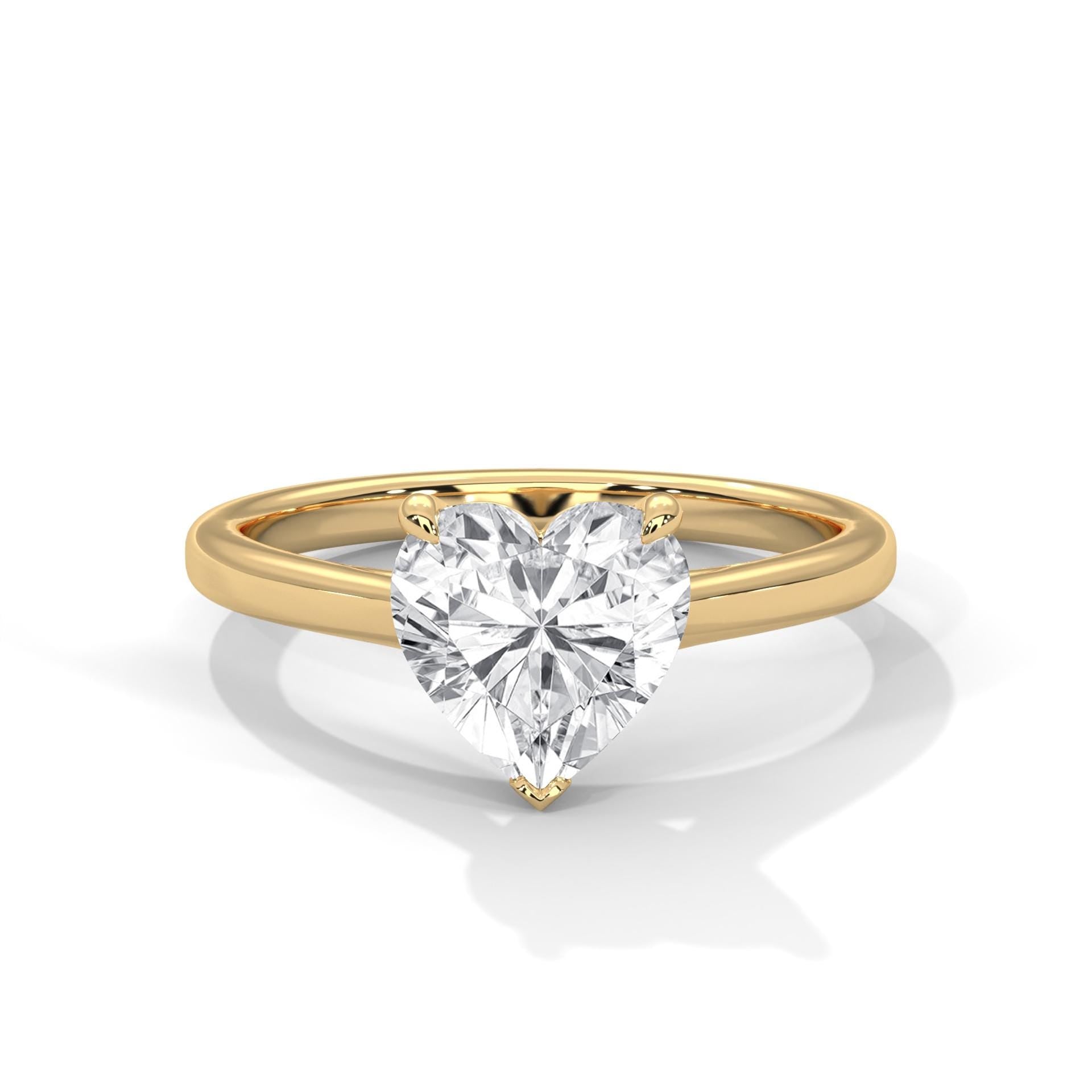 Heart cut lab grown diamond cathedral solitaire ring in yellow gold