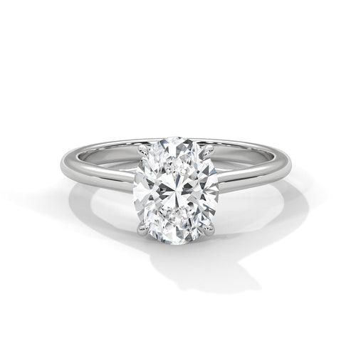 Oval cut lab grown diamond cathedral solitaire ring in white gold
