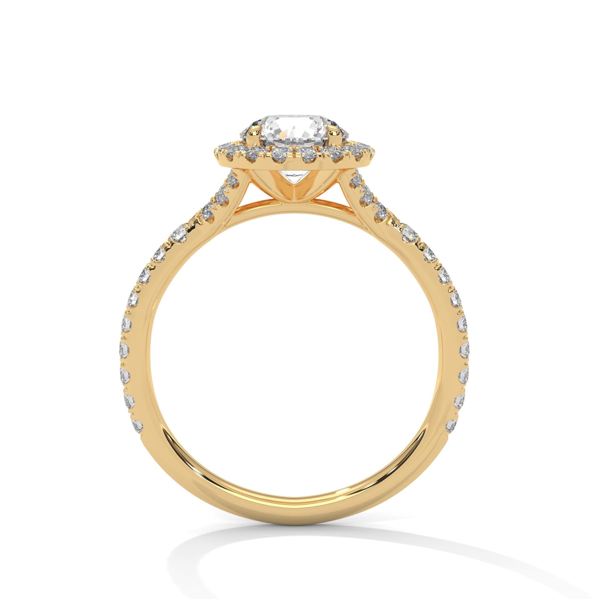 Yellow gold round halo solitaire with hand-set micro-pavé diamonds.