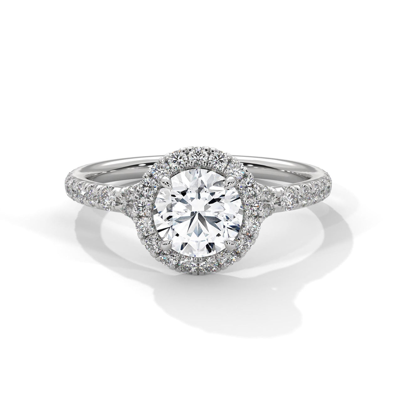 Round brilliant lab grown diamond halo ring with pavé diamond band in white gold