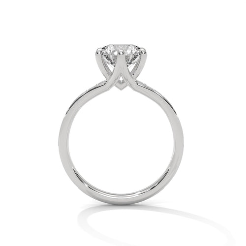 White gold round 6-prong engagement ring featuring a pavé diamond shank