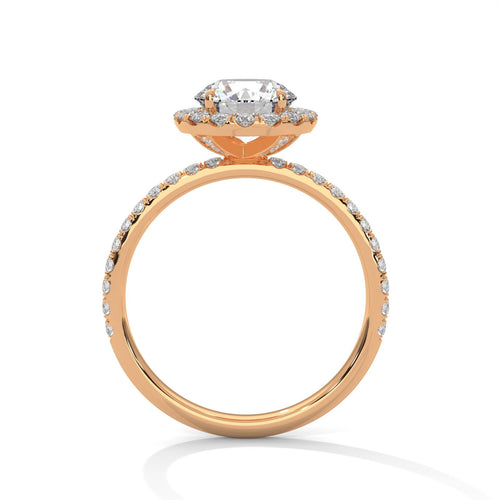 Rose gold round halo engagement ring featuring a shimmering pavé diamond shank