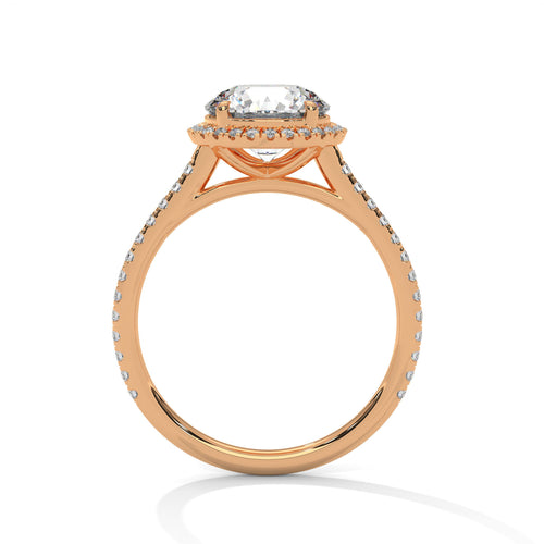 Detailed side view of a high-polish four-prong halo cathedral setting in rose gold.