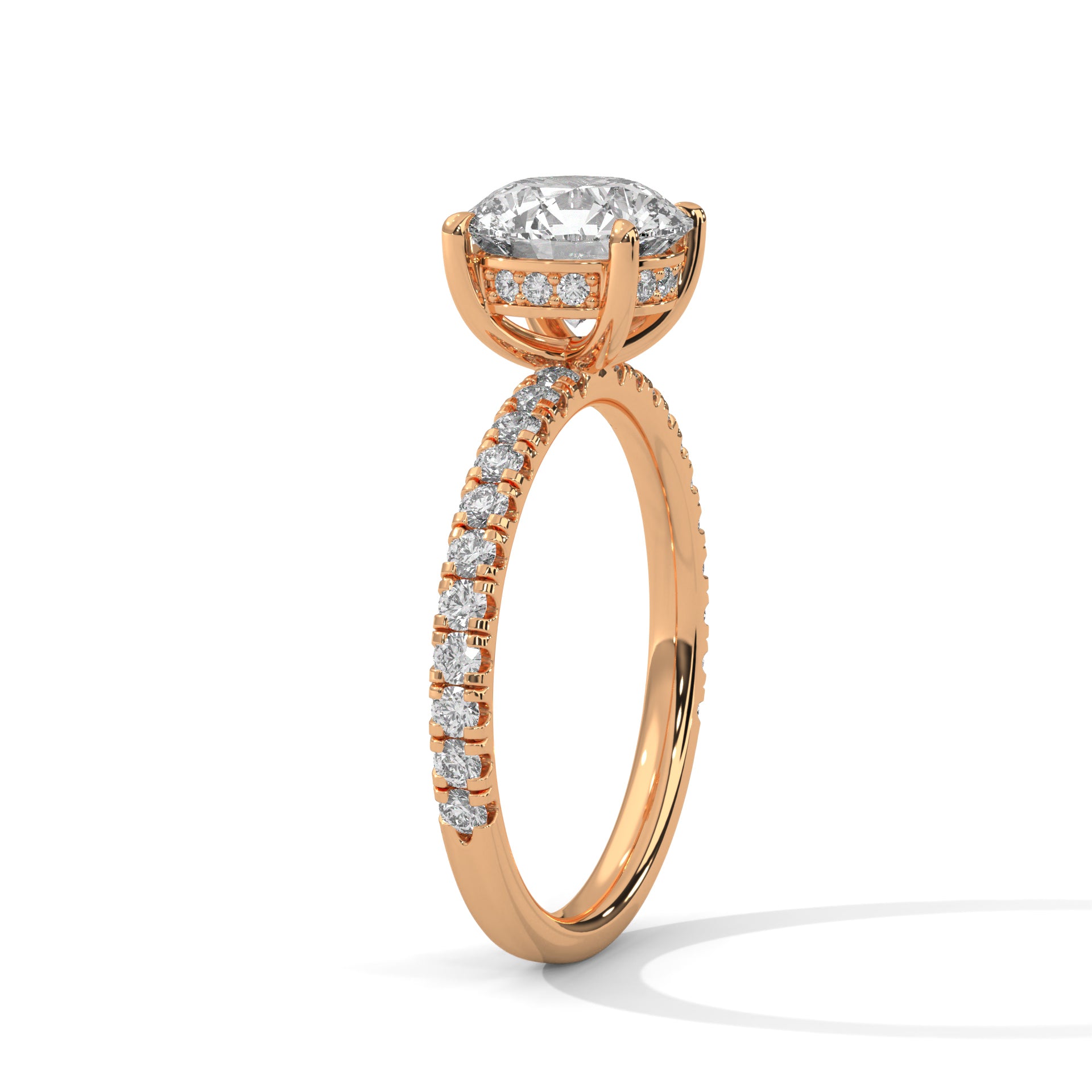 Detail view of round brilliant engagement ring showing slim 1.61mm French pavé band