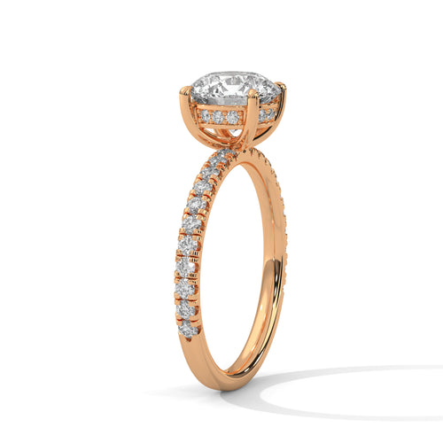 Detail view of round brilliant engagement ring showing slim 1.61mm French pavé band