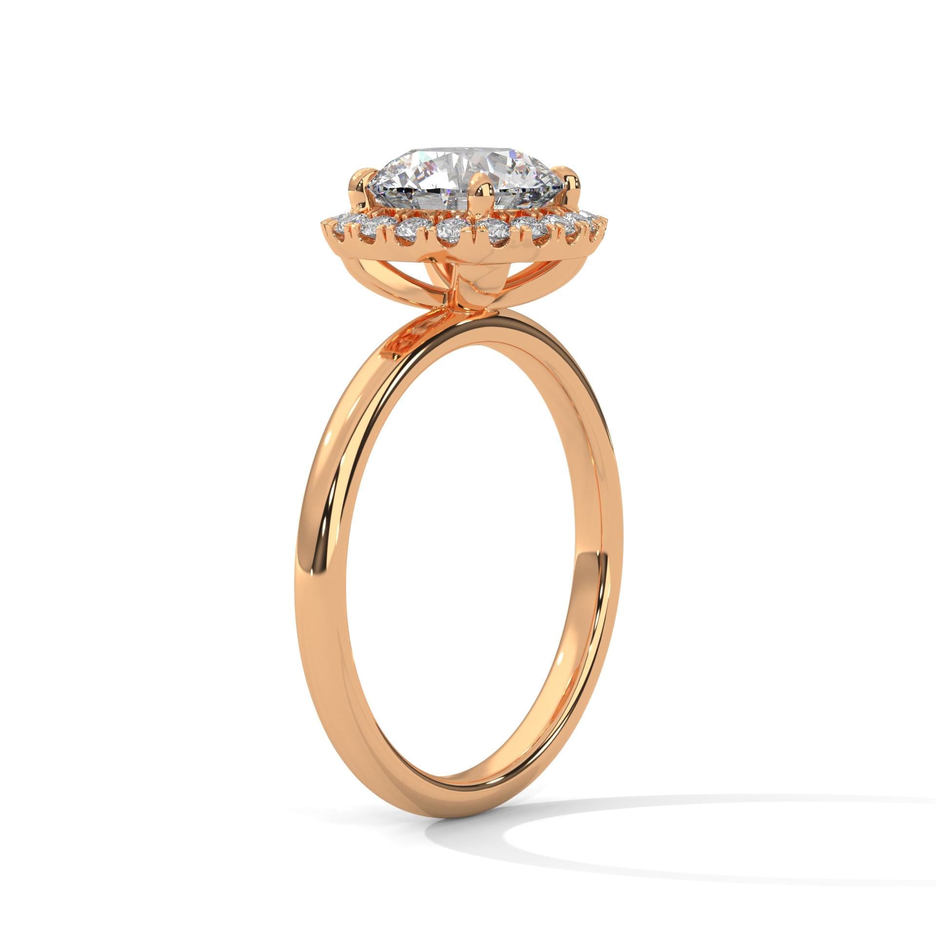 Underside view of rose gold 4-prong halo setting for round diamond