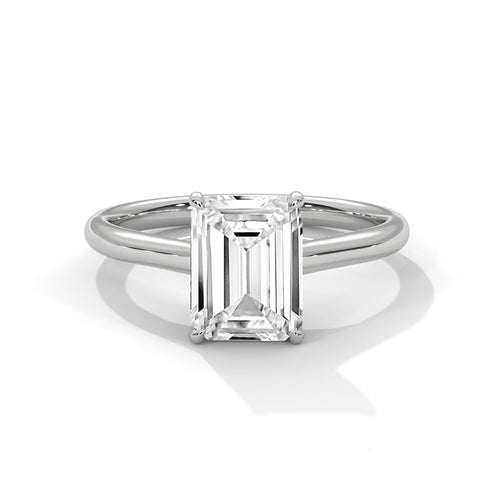 Architectural white gold cathedral setting for emerald shape diamond