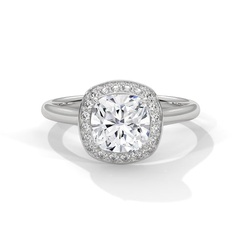 Cushion cut lab grown diamond halo solitaire in 18K white gold