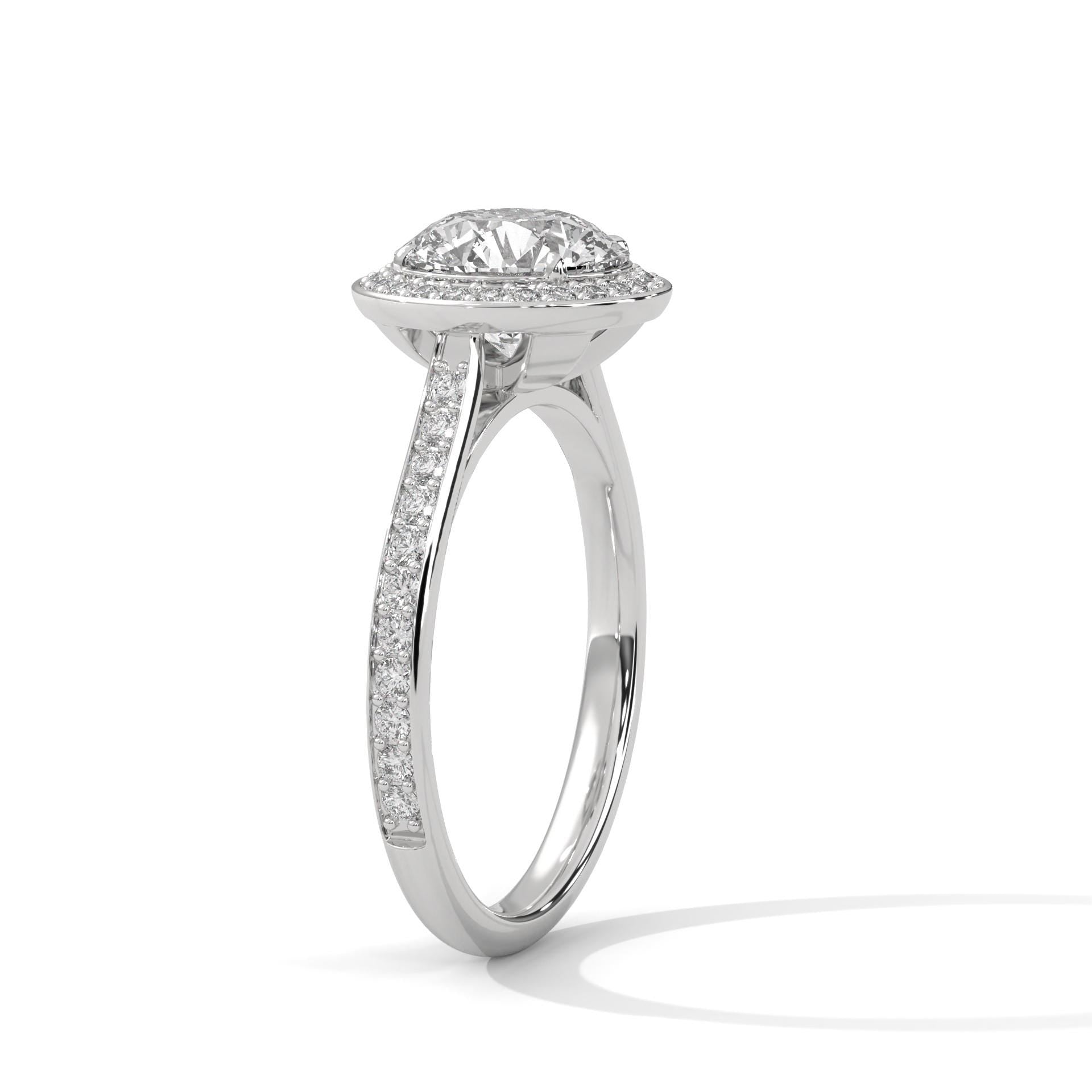 Angled view of 3 carat round lab diamond halo ring with pave-set side stone
