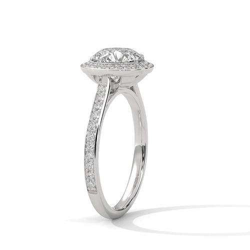 Angled view of 3 carat round lab diamond halo ring with pave-set side stone