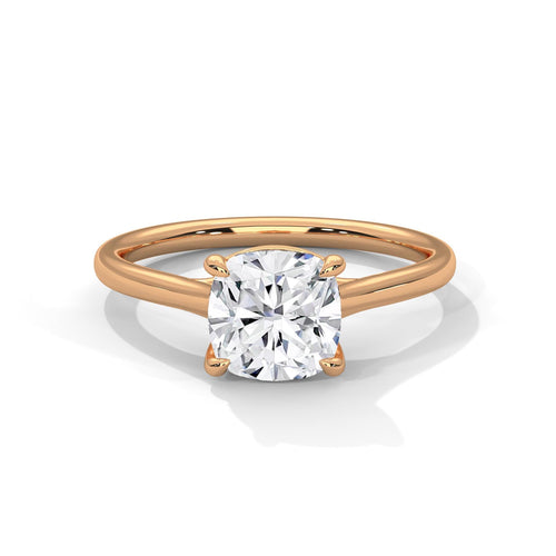 Cushion cut solitaire bridal ring with tapered rose gold band