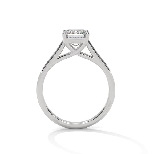 White gold radiant diamond engagement ring with high-polish cathedral band