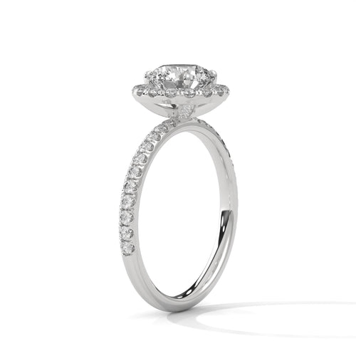 Architectural white gold halo setting with secure 4-prong mount