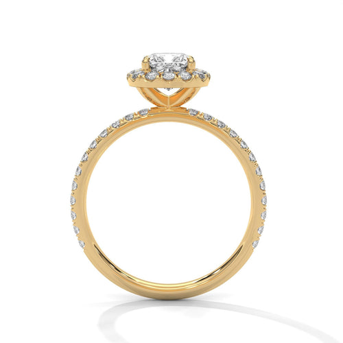 Yellow gold cushion halo engagement ring featuring a shimmering pavé diamond shank