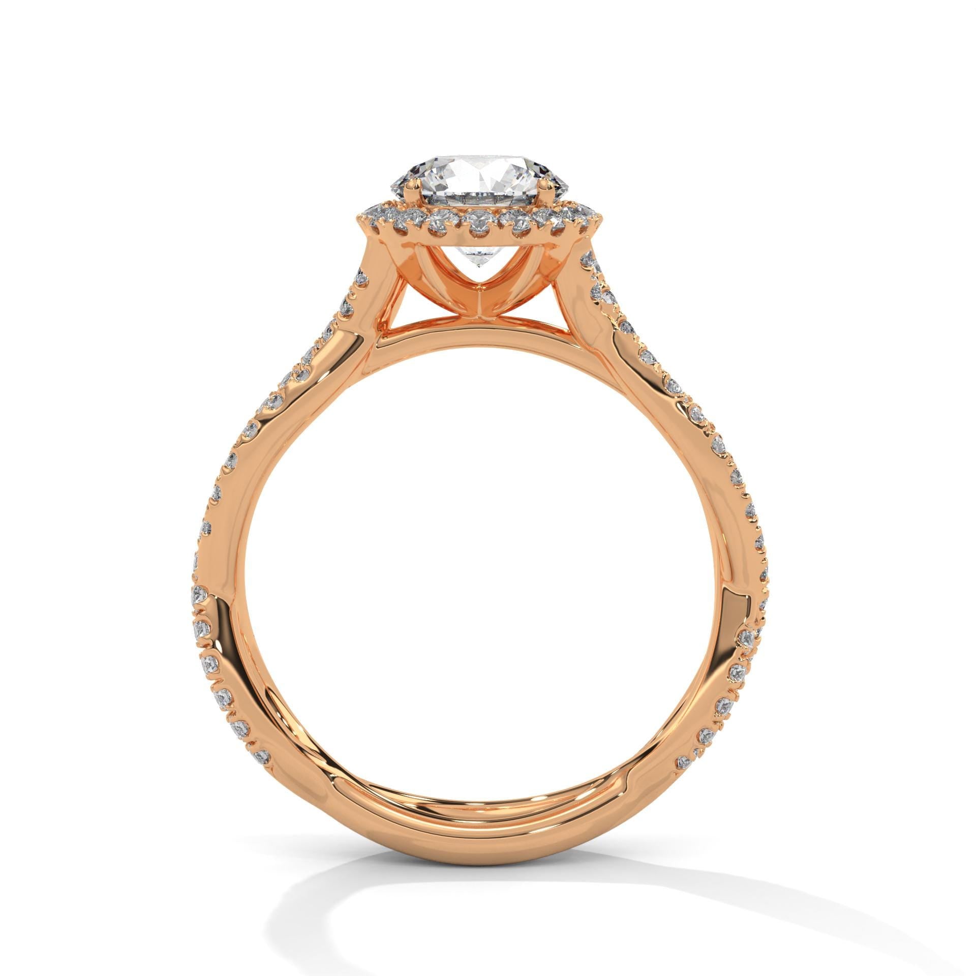 Rose gold round halo ring featuring a shimmering pavé diamond shank.