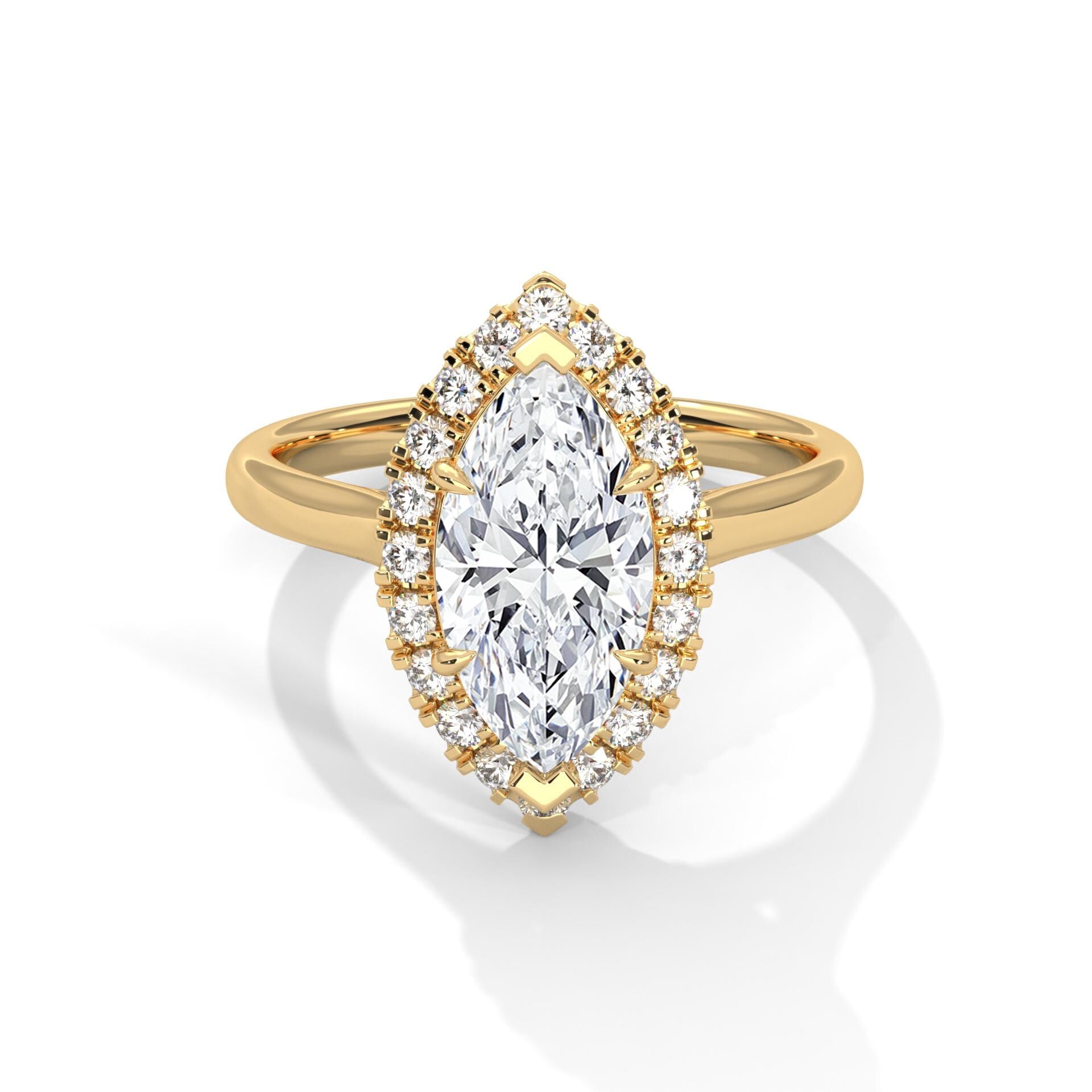 Colorless marquise cut lab diamond halo ring in yellow gold