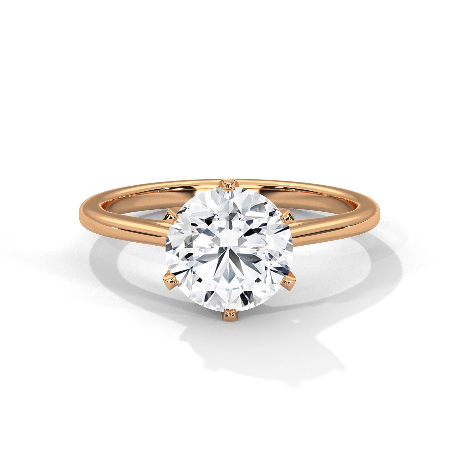 Round cut lab grown diamond cathedral solitaire ring in rose gold