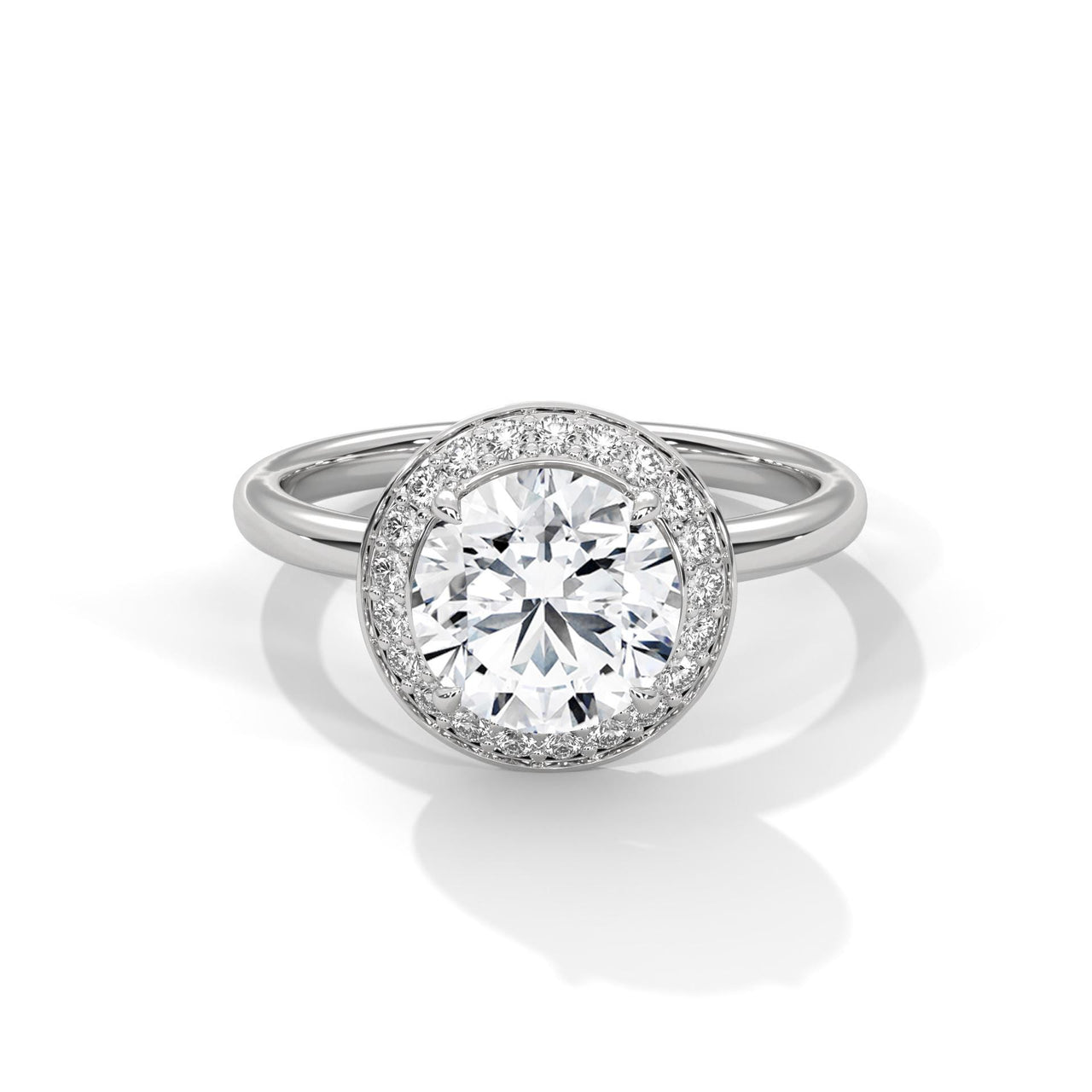 Colorless round cut lab diamond halo ring in white gold