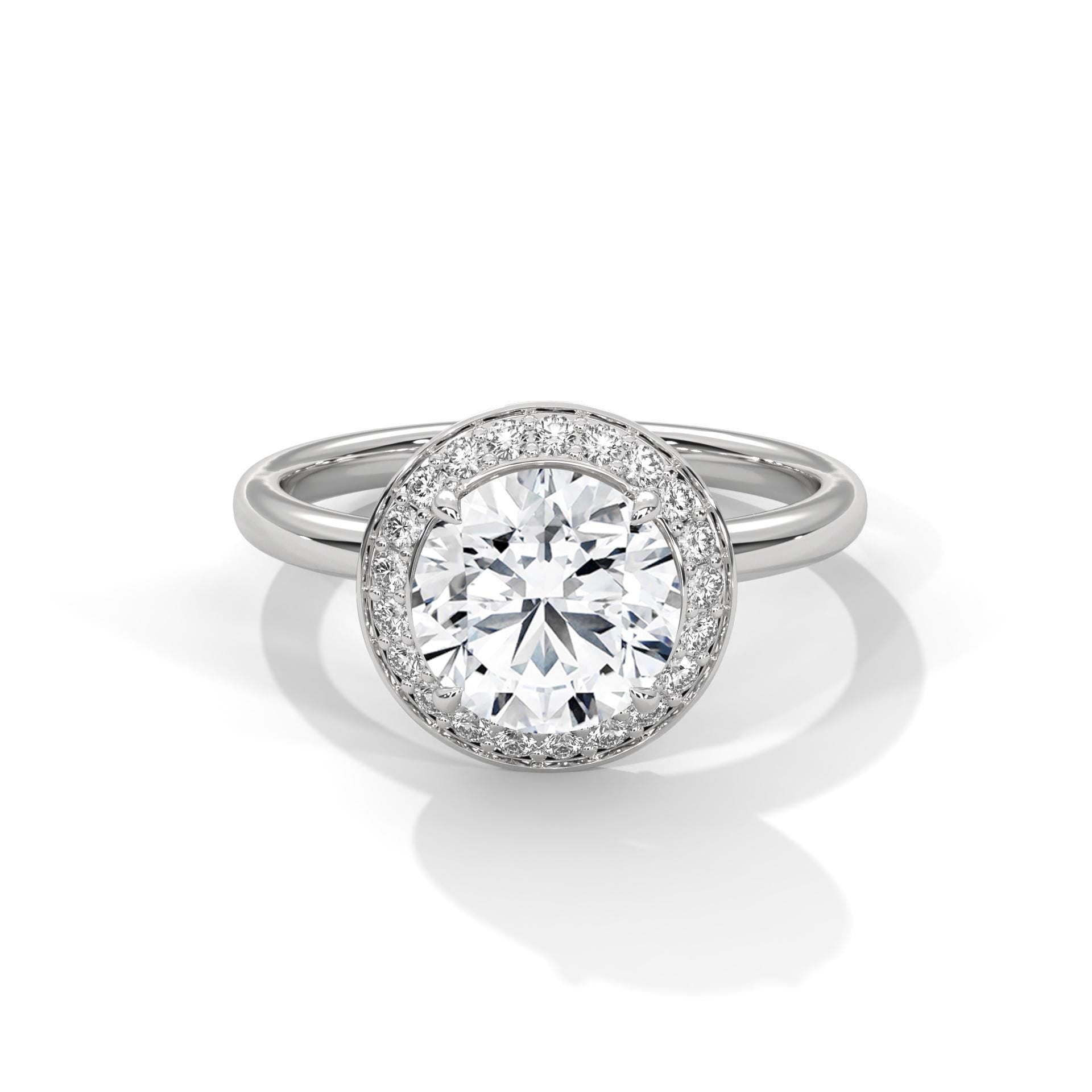 Colorless round cut lab diamond halo ring in white gold