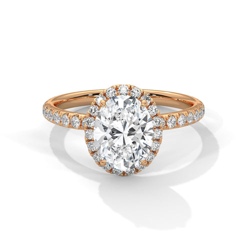 Oval lab grown diamond pave halo engagement ring in rose gold
