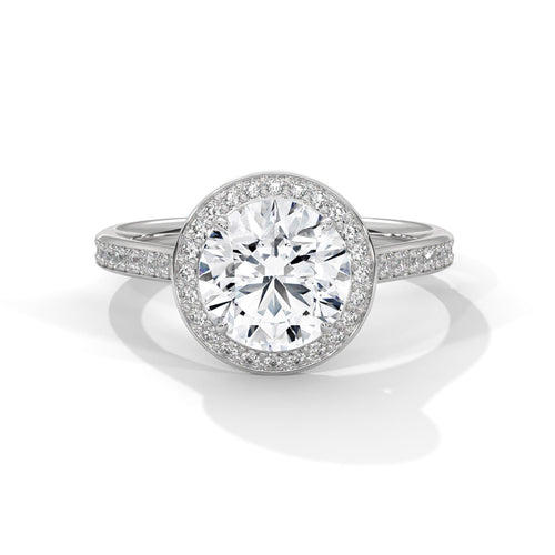 Round lab grown diamond halo engagement ring with pave diamond band in white gold