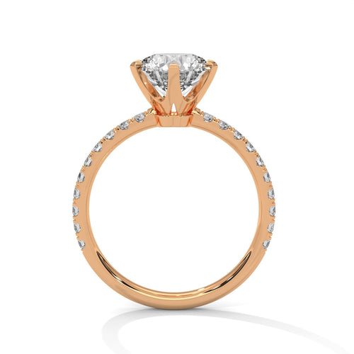 Rose gold round 6-prong engagement ring featuring a pavé diamond shank