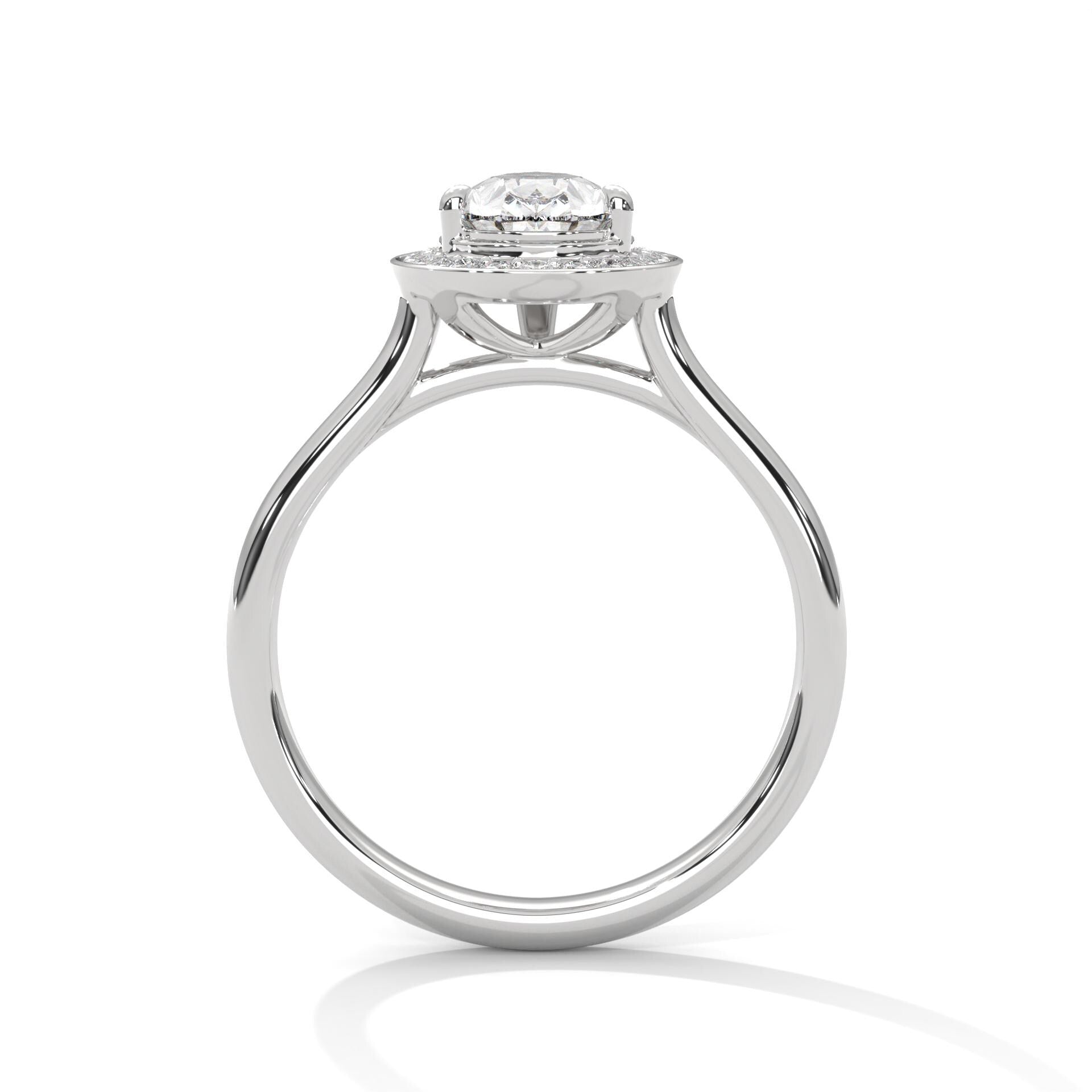 White gold pear halo engagement ring featuring a pavé diamond shank
