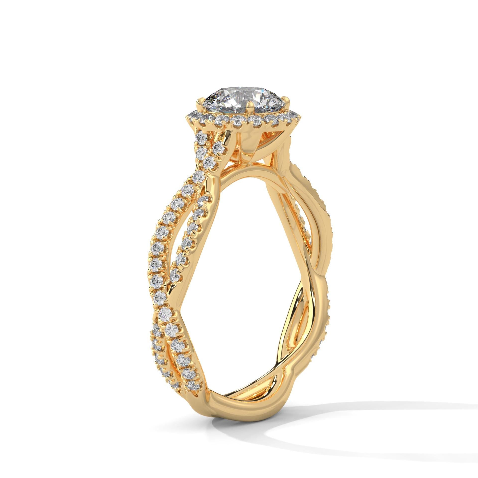Elevated yellow gold 4-prong halo mount for round brilliant diamond.