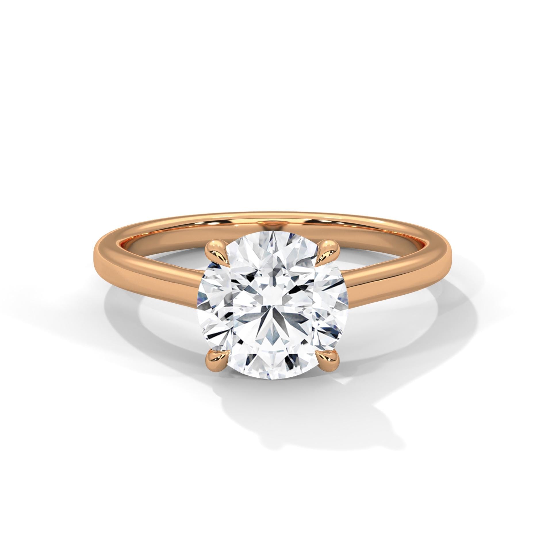 Round brilliant lab diamond ring on a minimalist 14K yellow gold band.