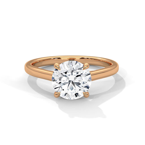 Round brilliant lab diamond ring on a minimalist 14K yellow gold band.