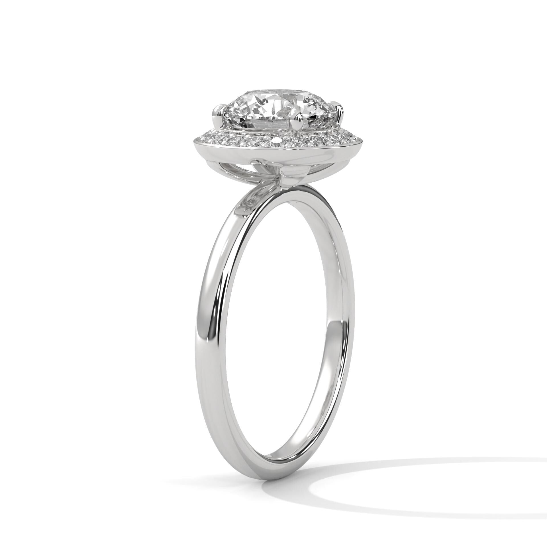 White gold round halo solitaire with a radiant diamond-set border
