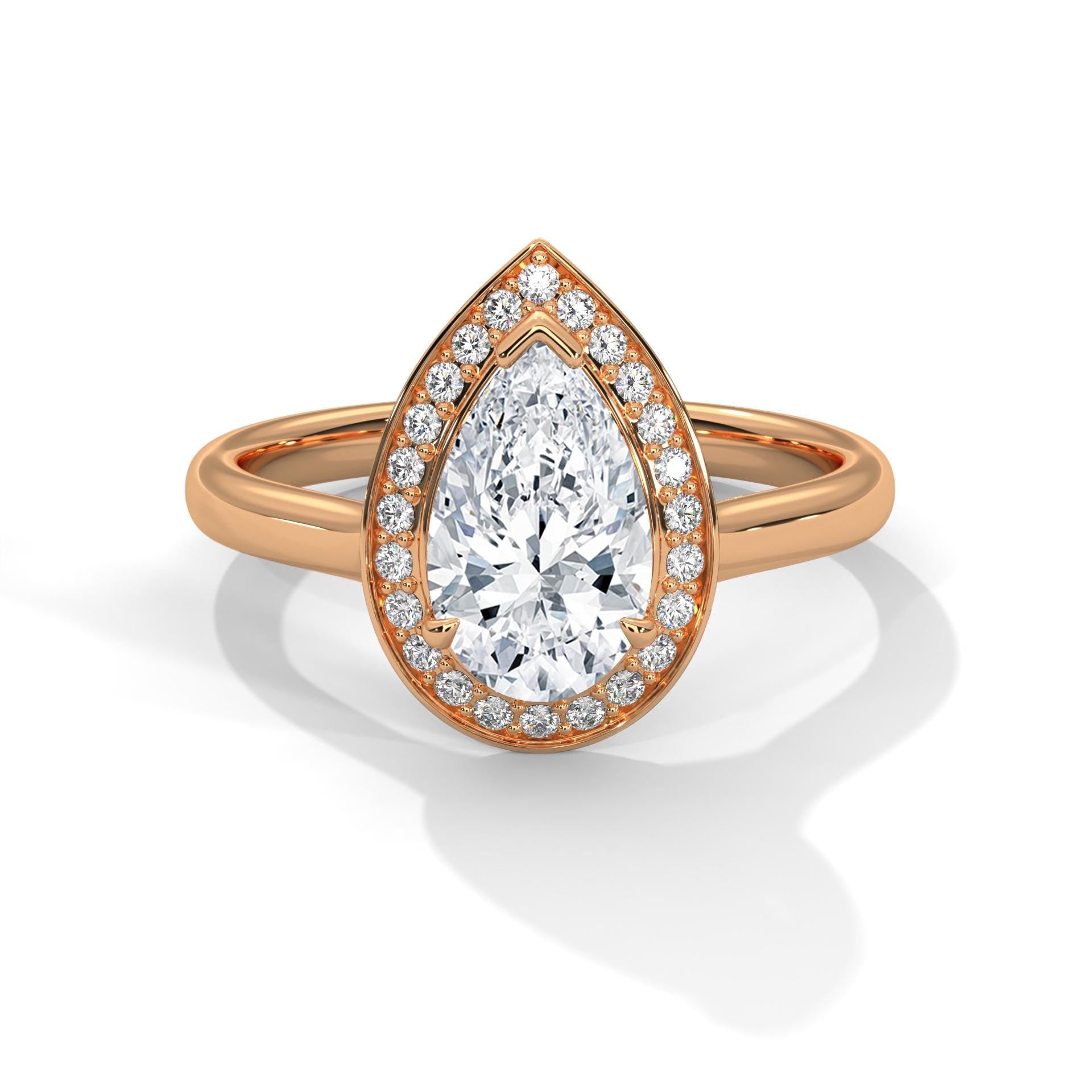 Pear cut lab grown diamond halo cathedral ring in rose gold