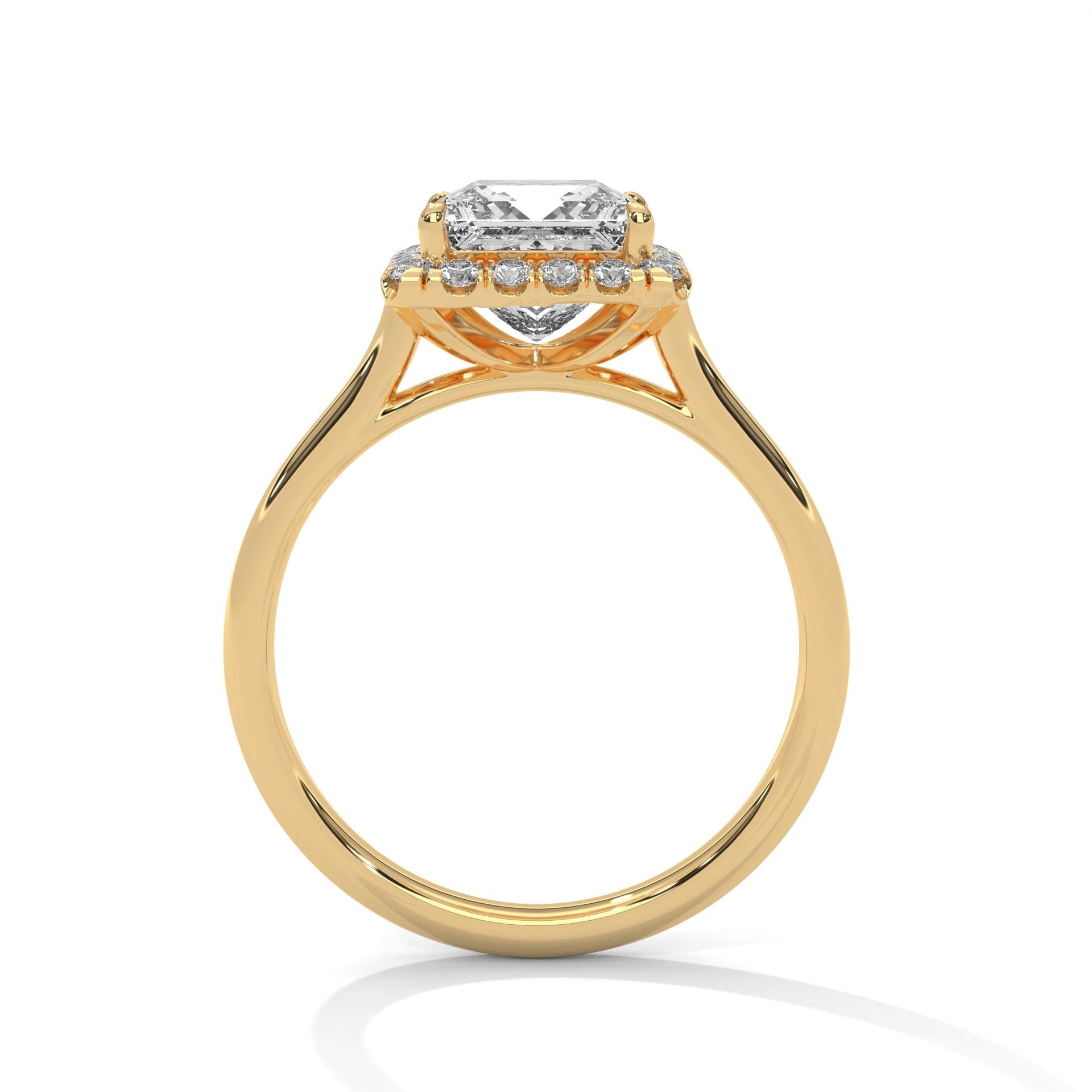 Yellow gold princess halo bridal ring featuring a minimalist polished band