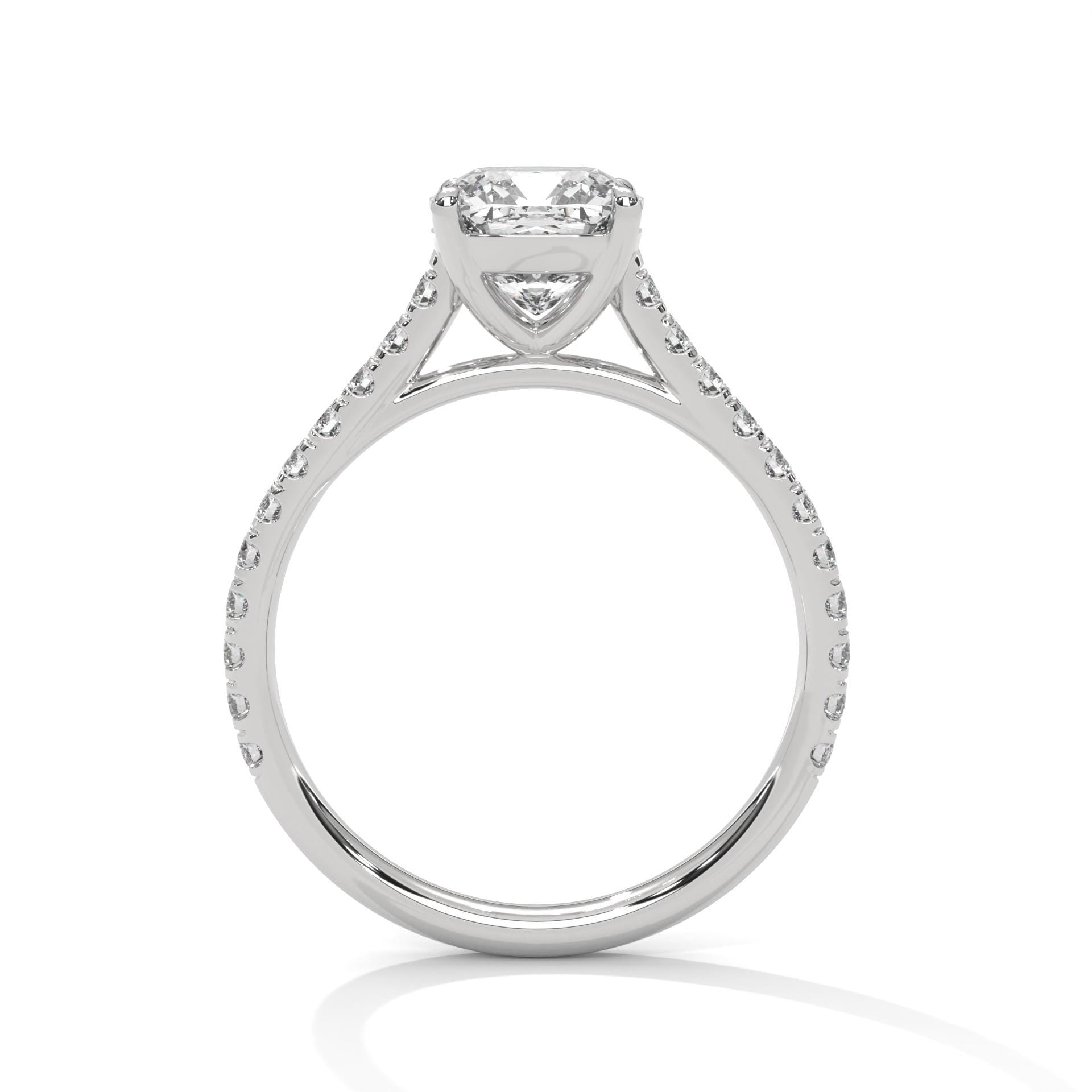 White gold cushion engagement ring with a shimmering pave diamond shank