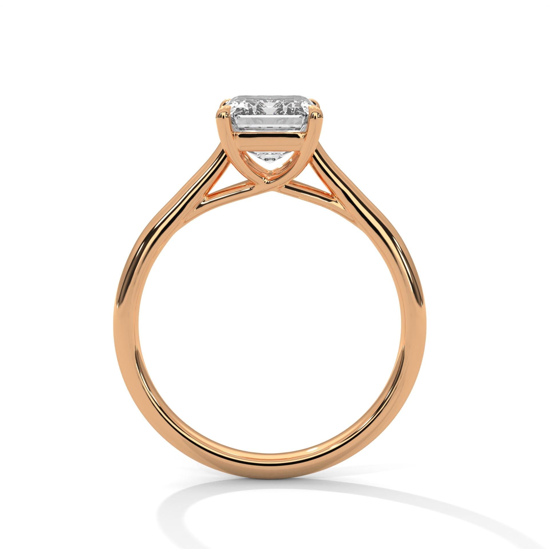 Side view of rose gold cathedral setting for emerald diamond ring