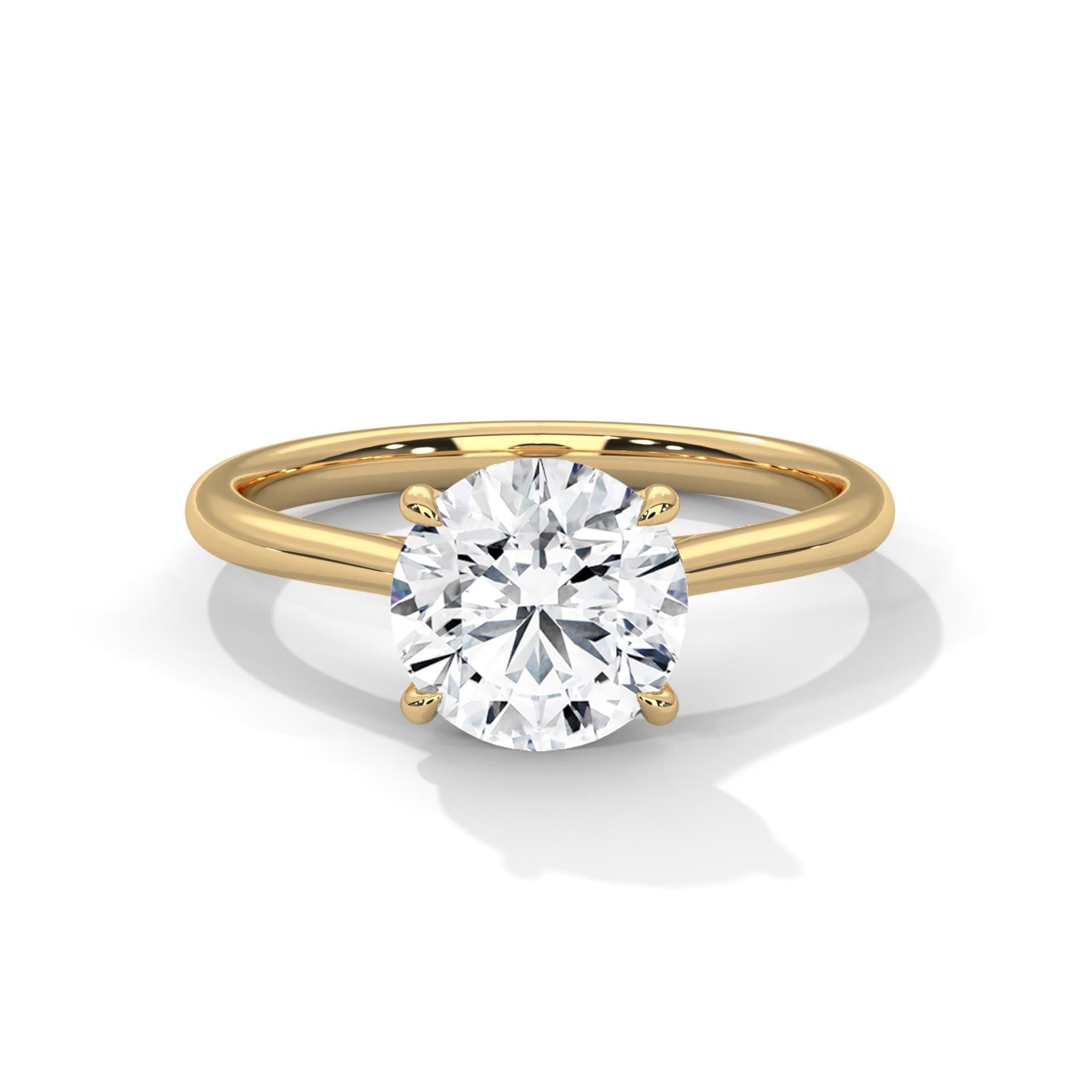Round brilliant lab grown diamond cathedral solitaire ring in white gold